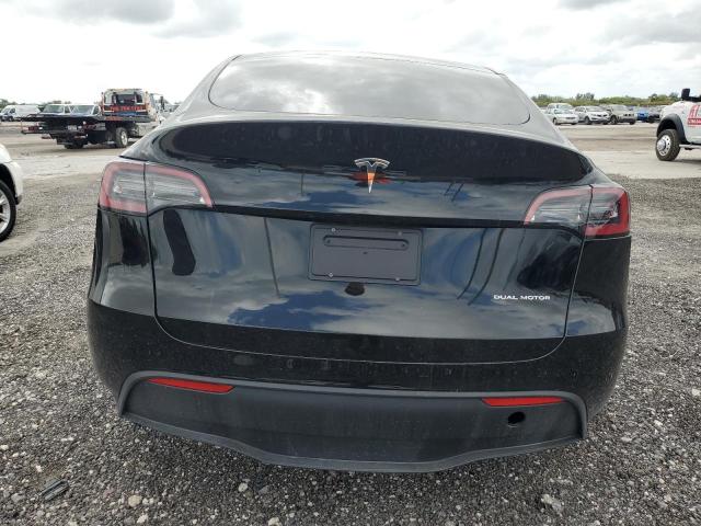 2023 Tesla Model Y VIN: 7SAYGAEEXPF770391 Lot: 48303854