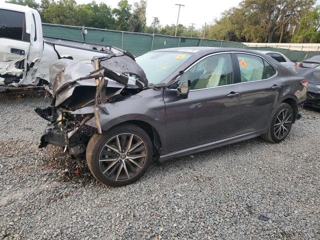 Lot #2438252771 2023 TOYOTA CAMRY SE N salvage car