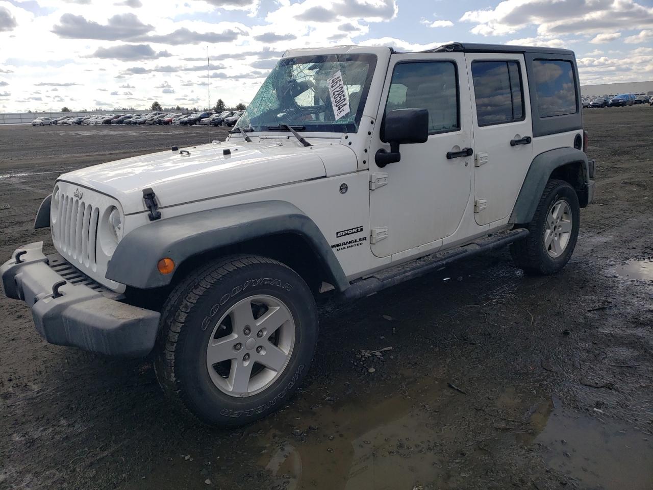 1C4HJWDG9GL320310 2016 Jeep Wrangler Unlimited Sport