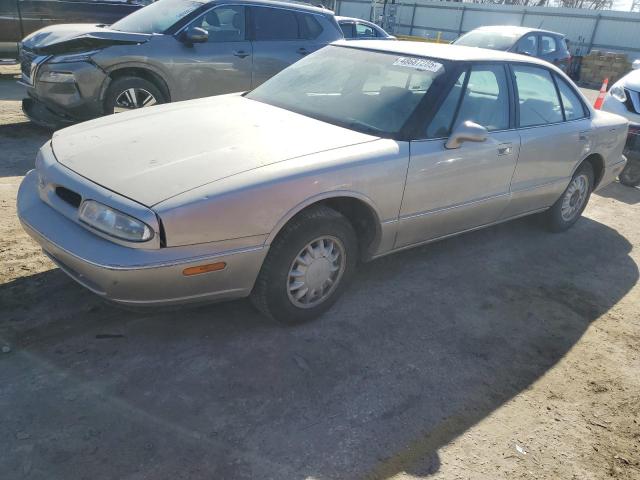 OLDSMOBILE 88 BASE 1997 gold  gas 1G3HN52K8V4855884 photo #1