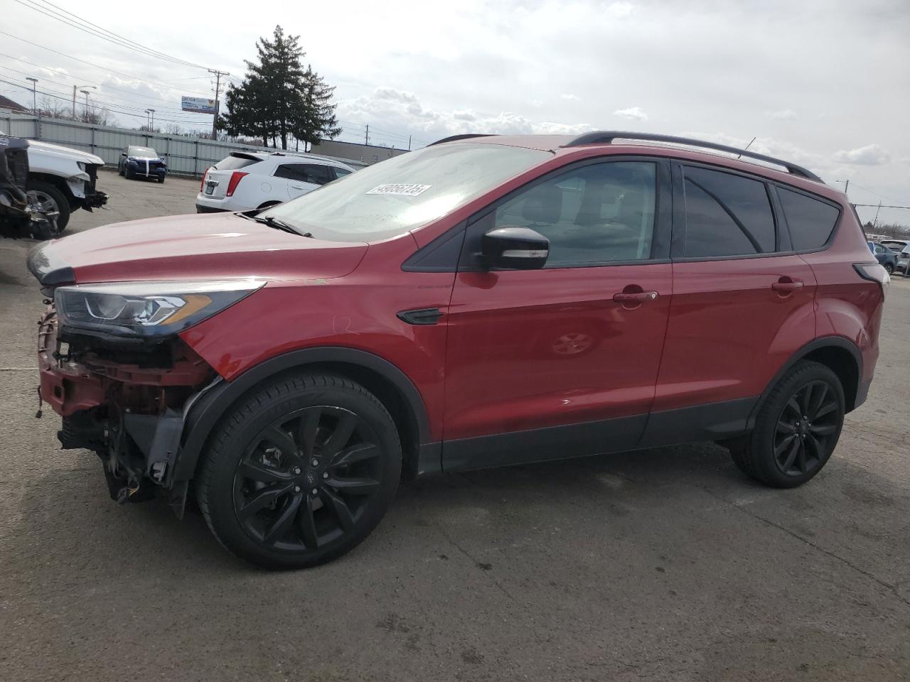1FMCU9J98HUE85233 FORD ESCAPE TIT 2017