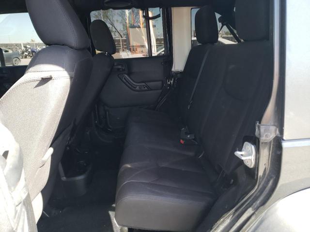 1C4HJWDG4EL310099 Jeep Wrangler Unlimited Sport
