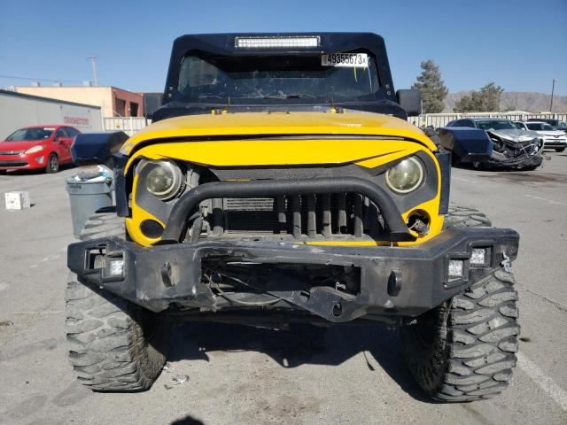 1C4BJWDG9FL670914 Jeep Wrangler Unlimited Sport