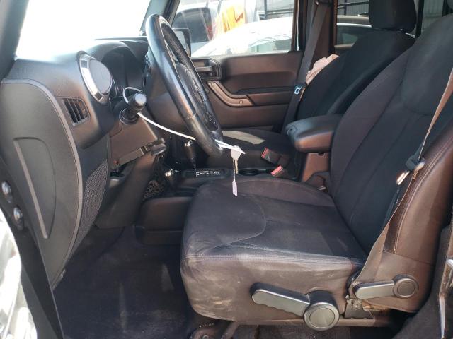 1C4HJWDG4EL310099 Jeep Wrangler Unlimited Sport