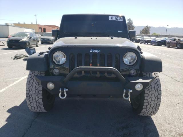 1C4HJWDG4EL310099 Jeep Wrangler Unlimited Sport