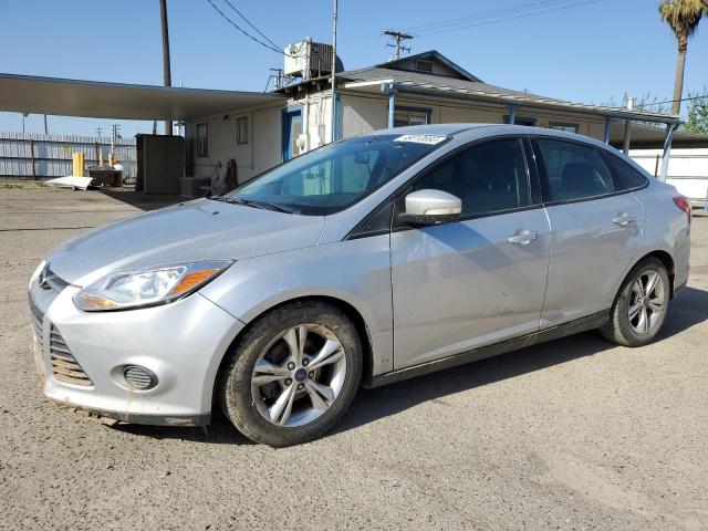 VIN 1FADP3F23DL335738 2013 FORD FOCUS no.1