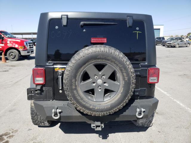 1C4HJWDG4EL310099 Jeep Wrangler Unlimited Sport