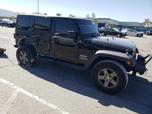 1C4HJWDG4EL310099 Jeep Wrangler Unlimited Sport