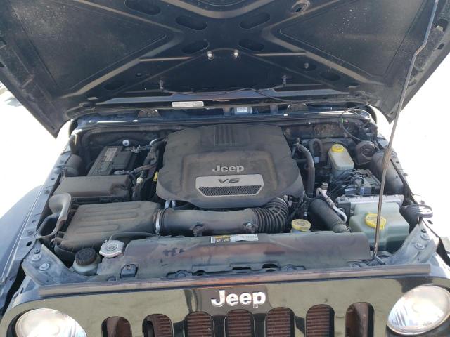 1C4HJWDG4EL310099 Jeep Wrangler Unlimited Sport