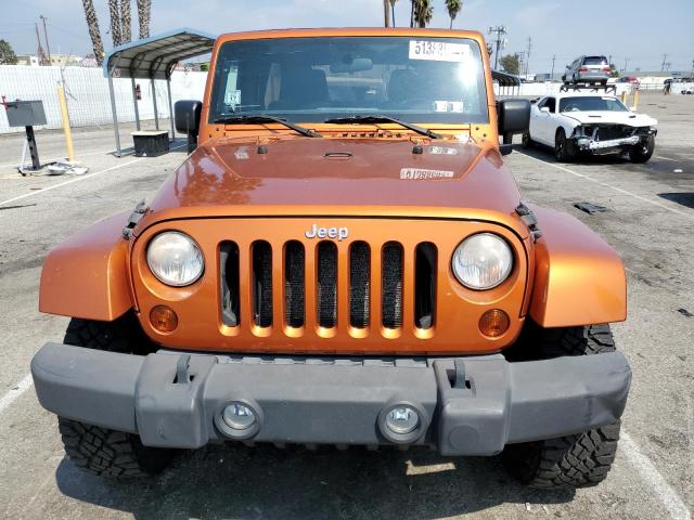 2011 Jeep Wrangler Unlimited Sahara VIN: 1J4BA5H17BL557211 Lot: 51388694