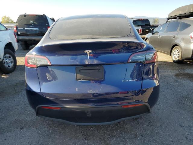 2023 Tesla Model Y VIN: 7SAYGDEE2PF897220 Lot: 52171204