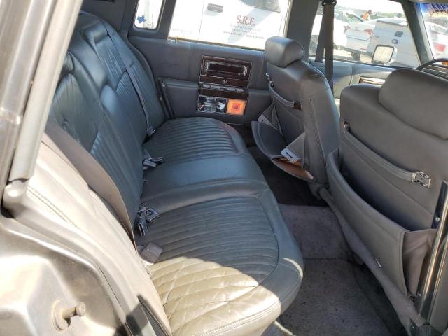 1990 Cadillac Brougham VIN: 1G6DW5470LR733673 Lot: 51052344