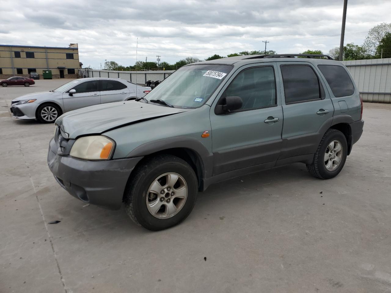 4F2CZ96114KM06385 2004 Mazda Tribute Es