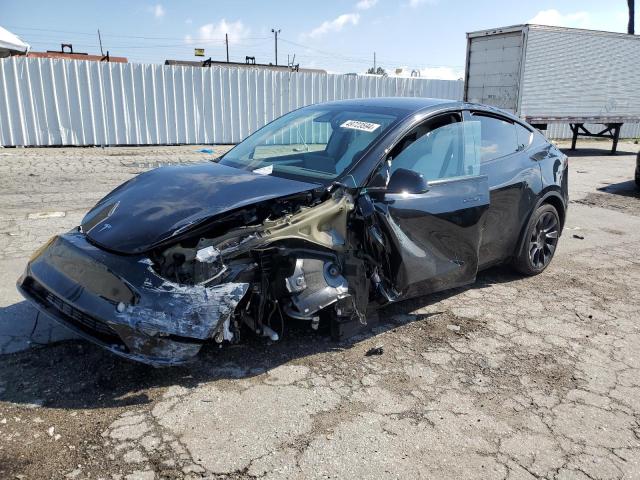 2023 Tesla Model Y VIN: 7SAYGDEE0PA119611 Lot: 49723594