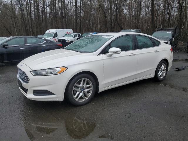 Lot #2475646788 2013 FORD FUSION SE salvage car