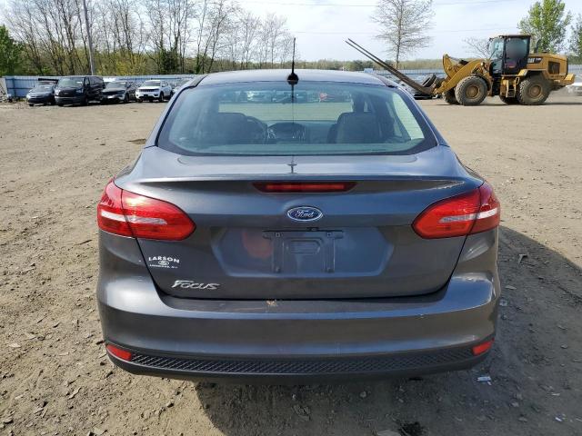 2018 Ford Focus S VIN: 1FADP3E20JL298385 Lot: 51648024