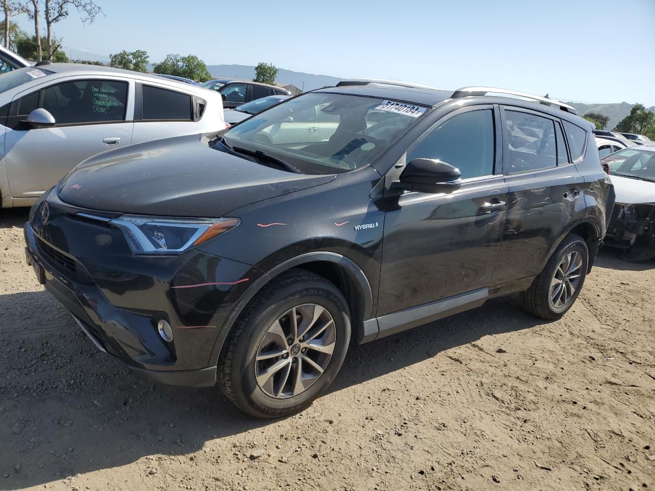 JTMRJREVXJD214565 2018 Toyota Rav4 Hv Le