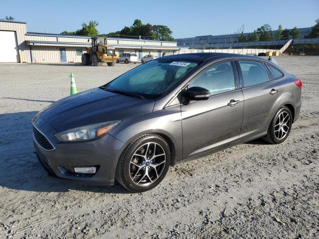 Lot #2500713296 2017 FORD FOCUS SEL salvage car