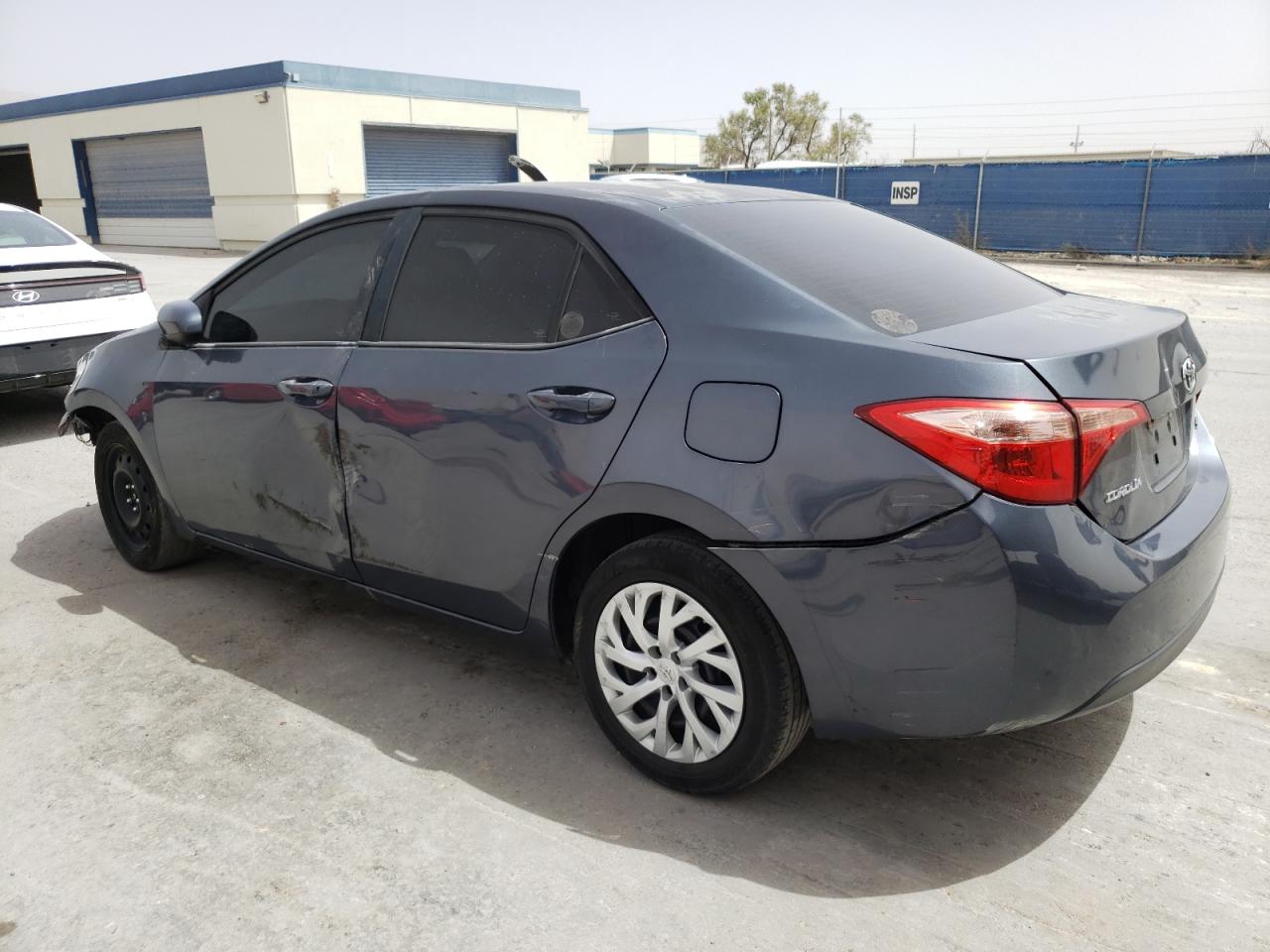 2018 Toyota Corolla L vin: 5YFBURHE6JP826053