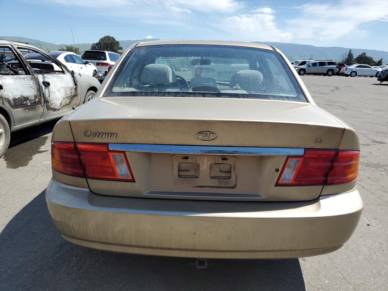 KNAGD126025106199 2002 Kia Optima Magentis