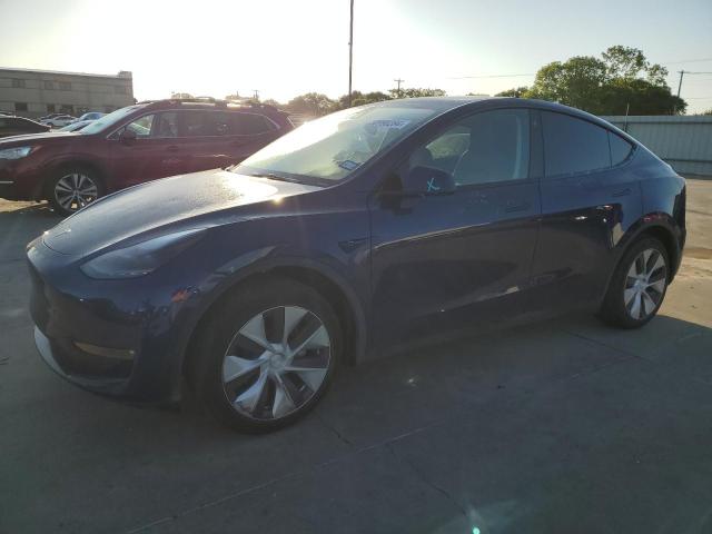 2023 Tesla Model Y VIN: 7SAYGAEE4PF704032 Lot: 50990284