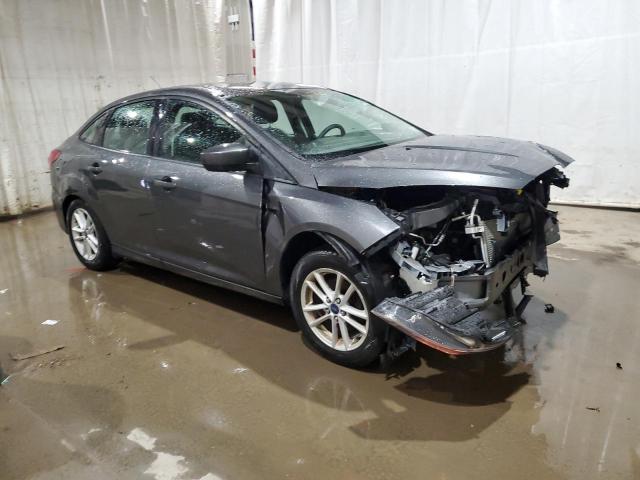 VIN 1FADP3F24JL208170 2018 Ford Focus, SE no.4