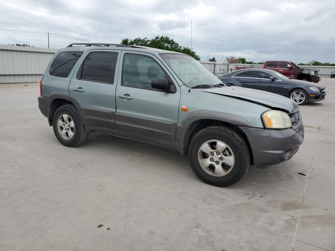 4F2CZ96114KM06385 2004 Mazda Tribute Es