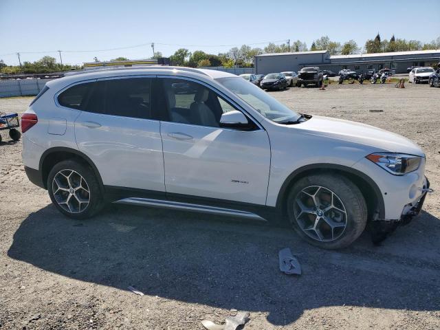 VIN WBXHT3C39H5F76675 2017 BMW X1, Xdrive28I no.4