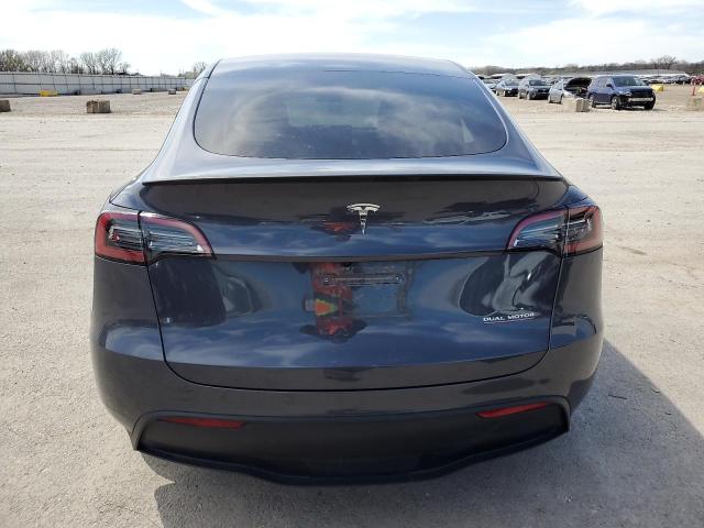 2023 Tesla Model Y VIN: 7SAYGDEF3PF855180 Lot: 49775284