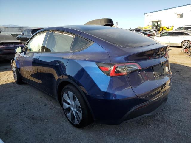 2023 Tesla Model Y VIN: 7SAYGDEE2PF897220 Lot: 52171204