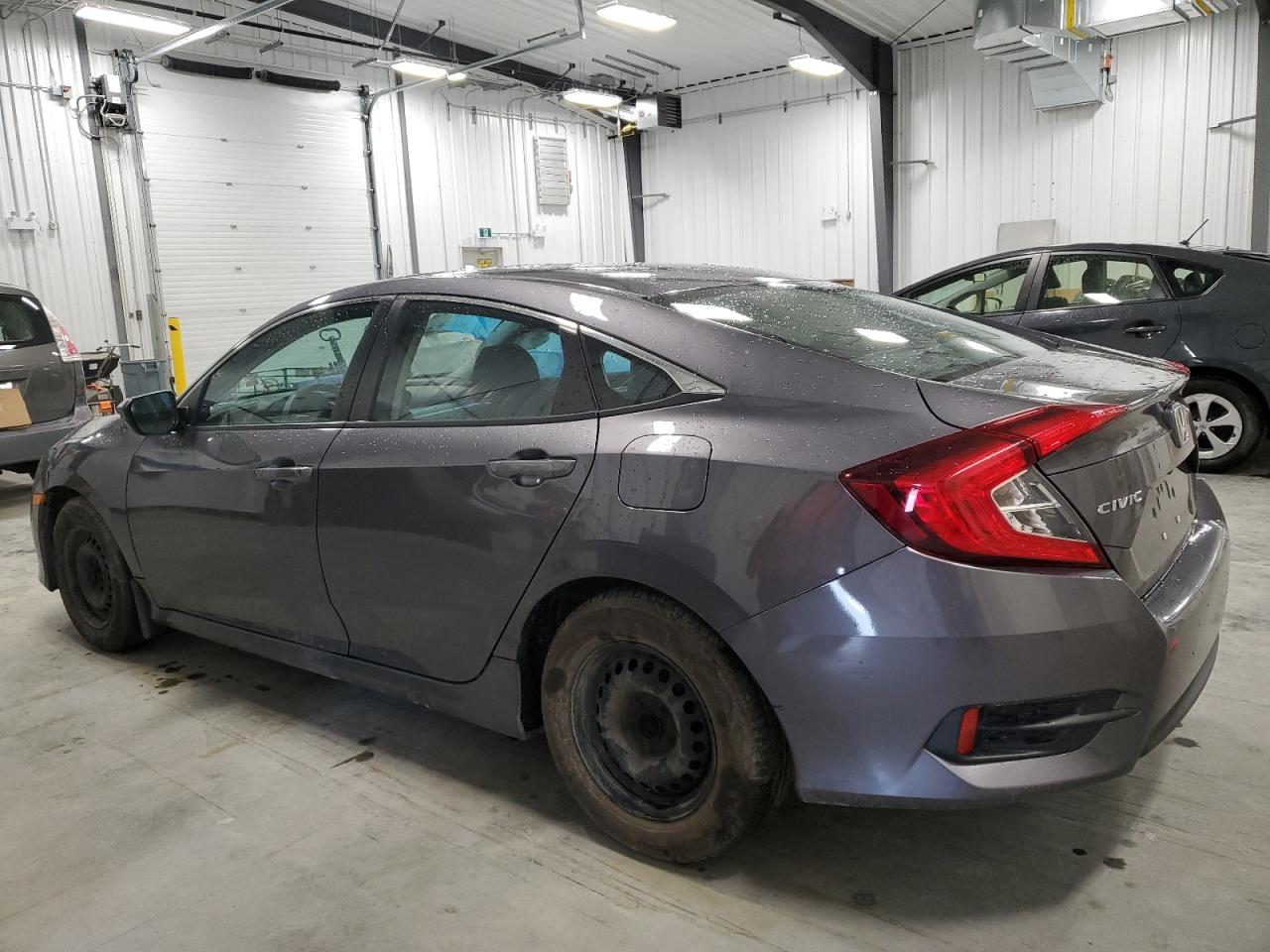 2HGFC2F54GH037334 2016 Honda Civic Lx