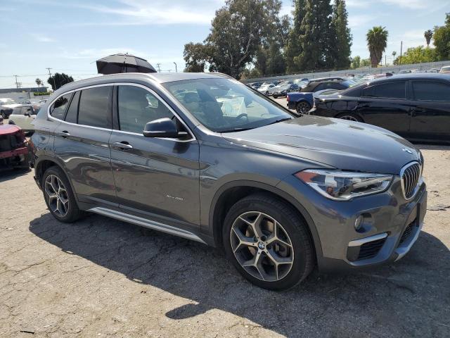 VIN WBXHT3C35H5F69982 2017 BMW X1, Xdrive28I no.4