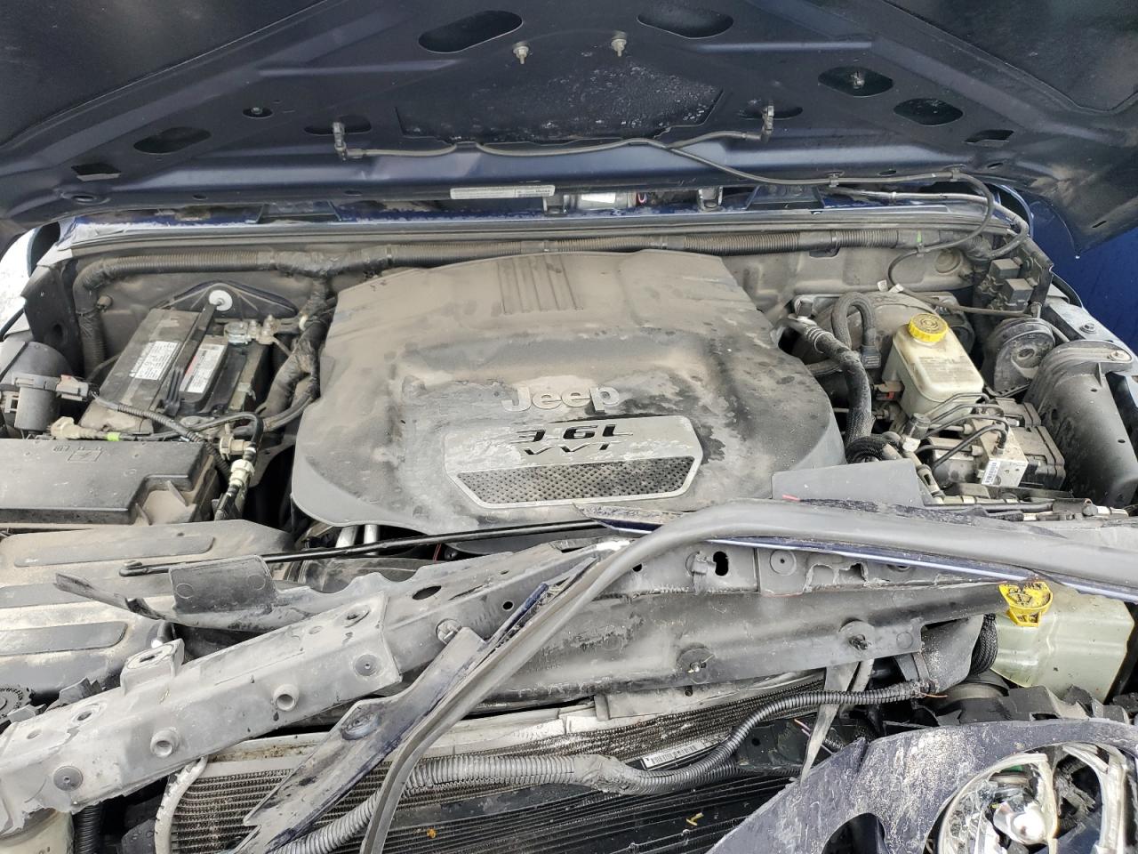 1C4BJWDG9DL631107 2013 Jeep Wrangler Unlimited Sport