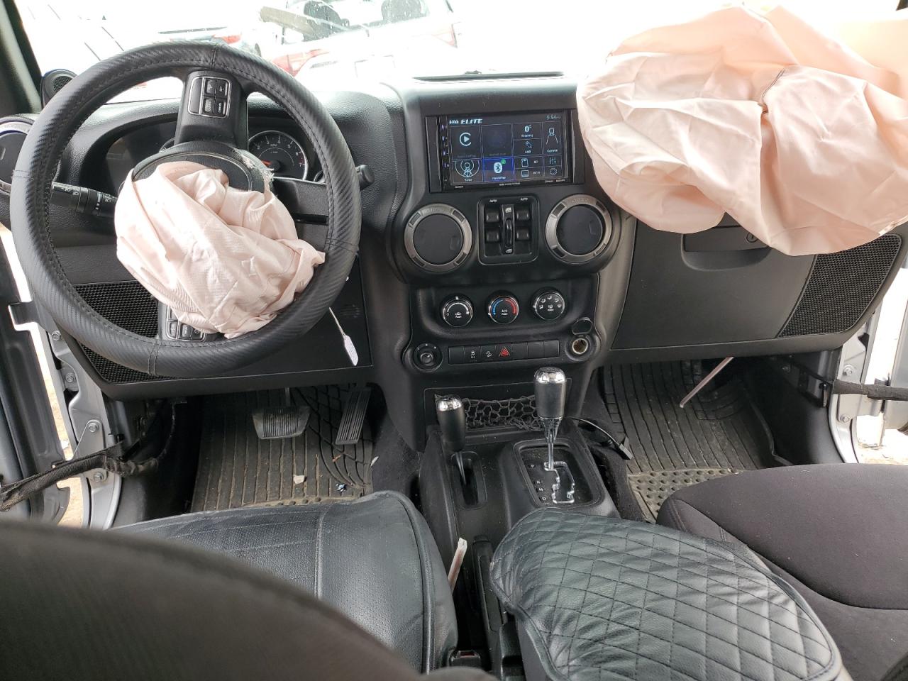 1C4BJWDGXEL129949 2014 Jeep Wrangler Unlimited Sport