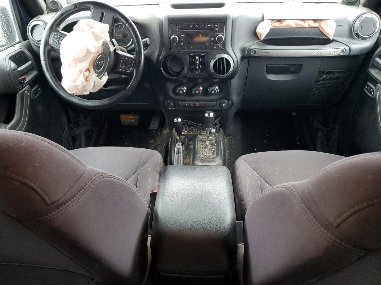 1C4BJWDG9DL631107 2013 Jeep Wrangler Unlimited Sport