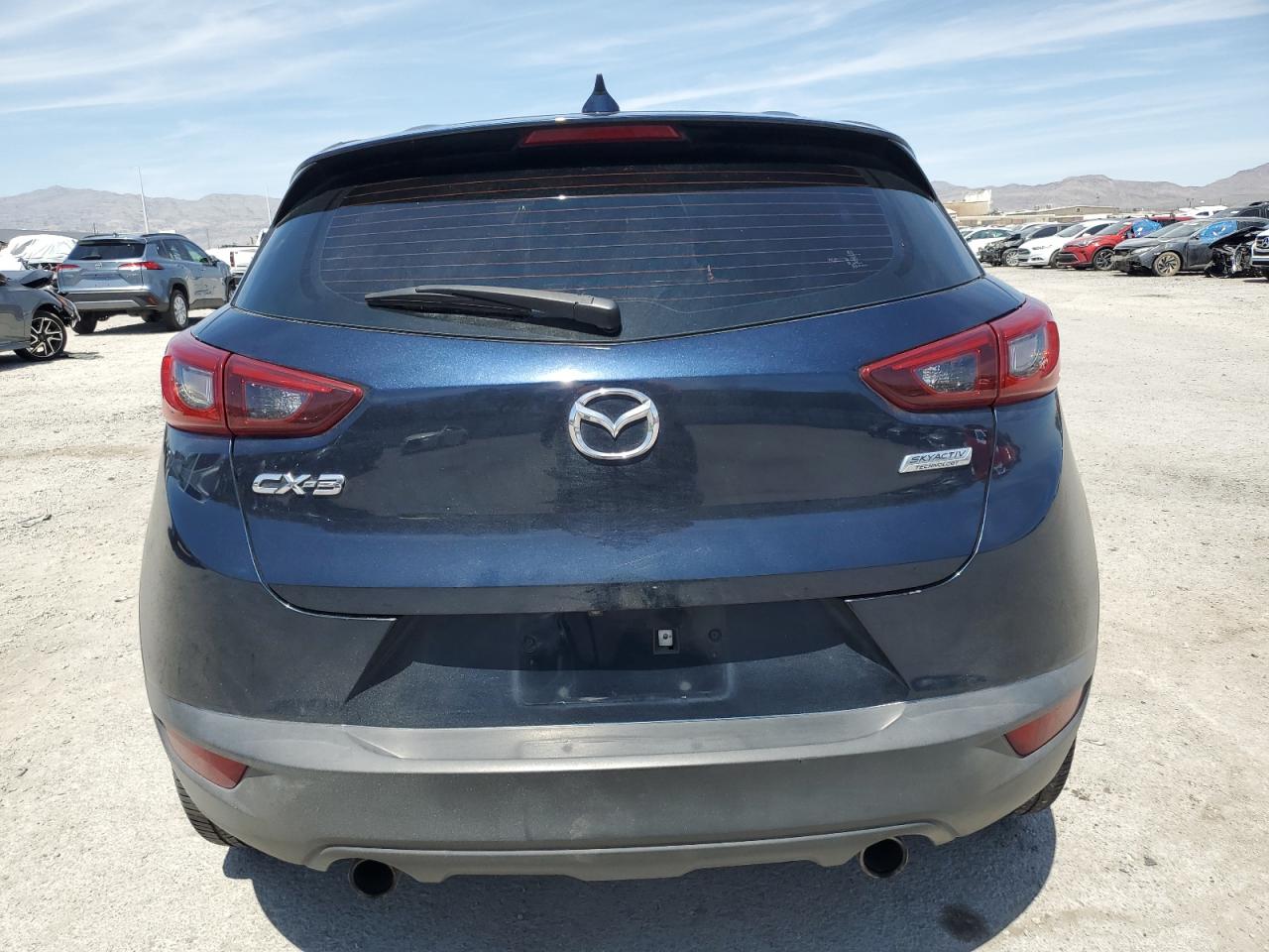 JM1DKDC78J0310779 2018 Mazda Cx-3 Touring