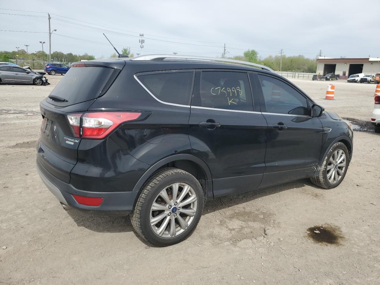 1FMCU0JD0HUC75998 2017 Ford Escape Titanium