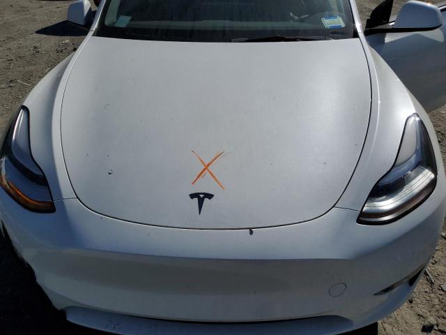 2023 Tesla Model Y VIN: 7SAYGDEE7PA057401 Lot: 51695254