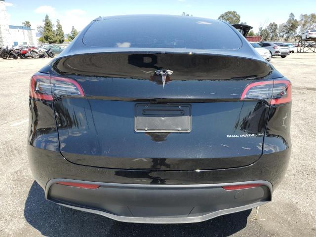 2023 Tesla Model Y VIN: 7SAYGDEE5PF889208 Lot: 50067264