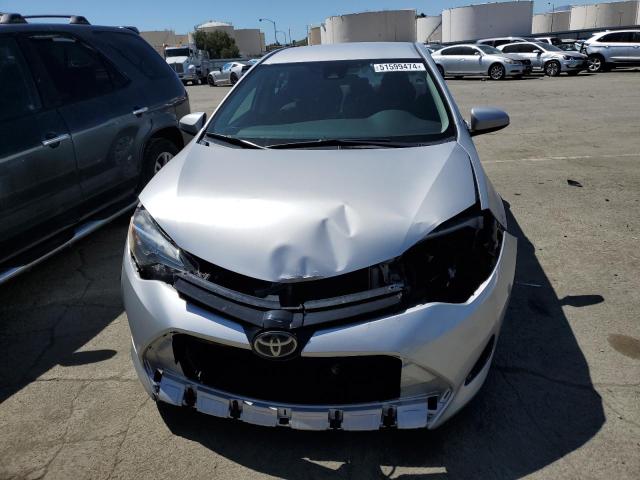 2017 Toyota Corolla L VIN: 5YFBURHE7HP700276 Lot: 51599474
