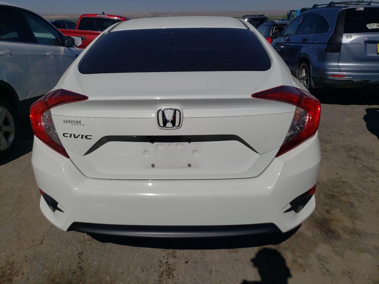 19XFC2F51JE040869 2018 Honda Civic Lx 19XFC2F51JE040869 2018 Honda Civic Lx