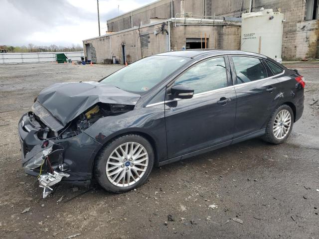2014 Ford Focus Titanium VIN: 1FADP3J2XEL101802 Lot: 49819454