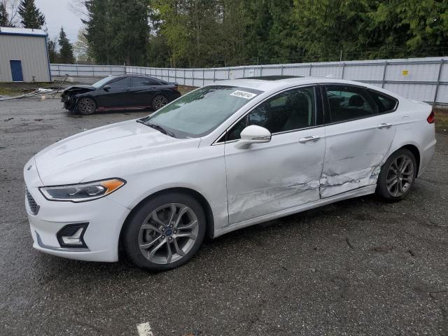 Lot #2524695461 2020 FORD FUSION TIT salvage car