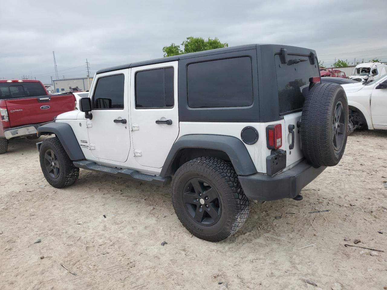 1C4BJWDG0GL308827 2016 Jeep Wrangler Unlimited Sport