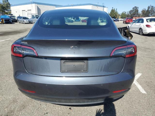 2020 Tesla Model 3 VIN: 5YJ3E1EA3LF661047 Lot: 49228574