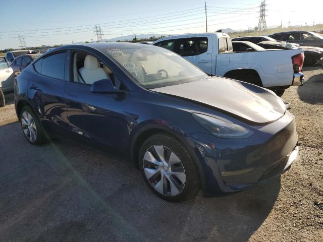 2023 Tesla Model Y VIN: 7SAYGDEE2PF897220 Lot: 52171204