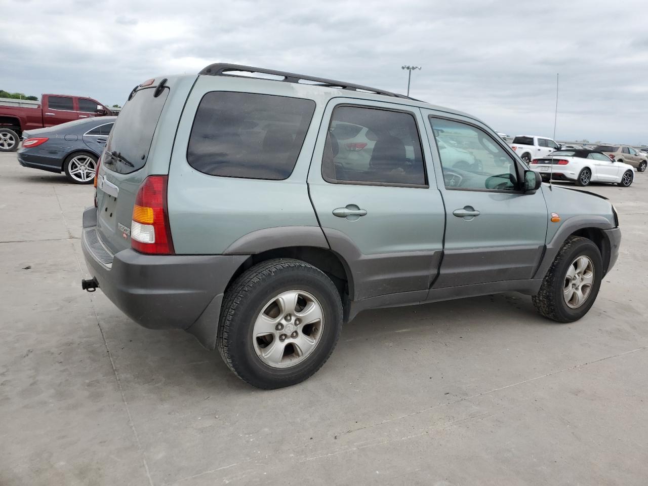 4F2CZ96114KM06385 2004 Mazda Tribute Es