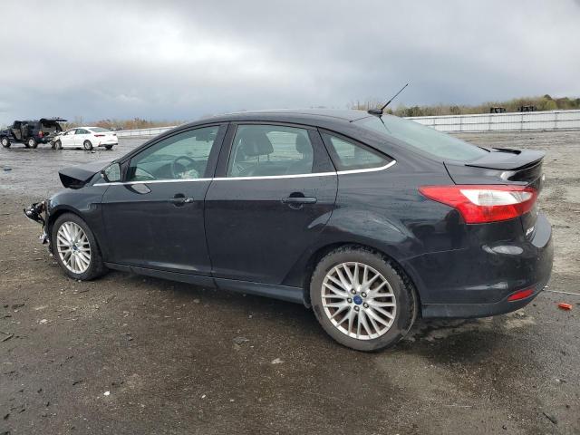 2014 Ford Focus Titanium VIN: 1FADP3J2XEL101802 Lot: 49819454
