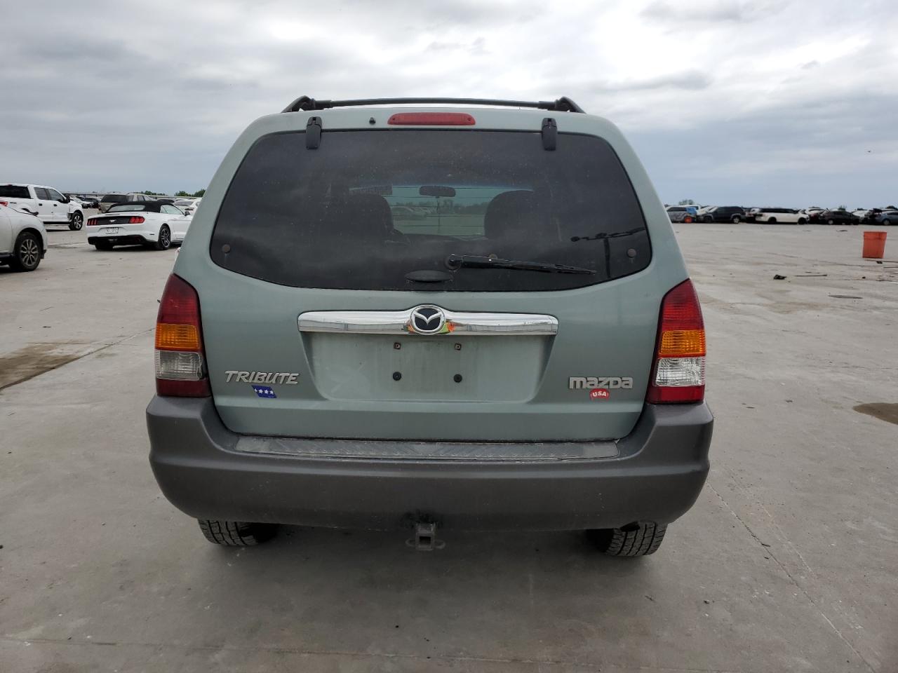 4F2CZ96114KM06385 2004 Mazda Tribute Es