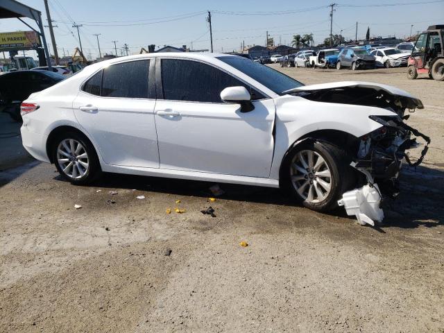 VIN 4T1B11HKXKU744245 2019 Toyota Camry, L no.4